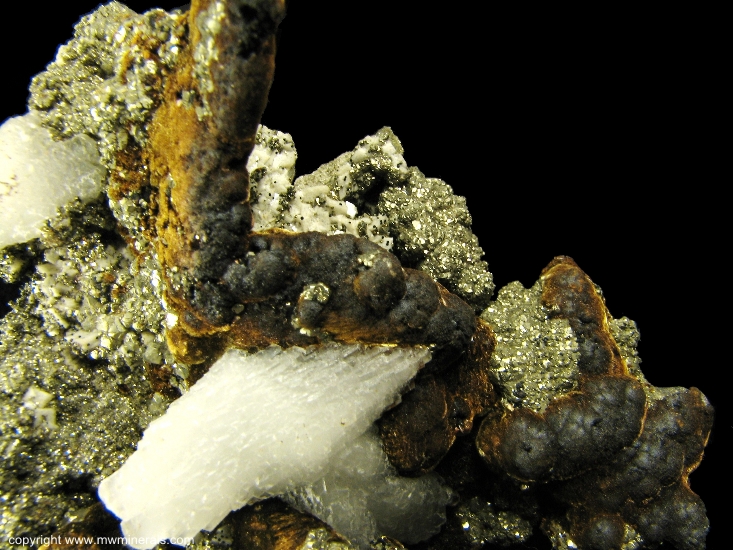 Mineral Specimen: Pyrite, Goethite and Calcite from Approximately 2400 foot level, Algoma Ore Property, Division of Algoma, Steel Corporation, Wawa, Algoma District, Ontario, Canada