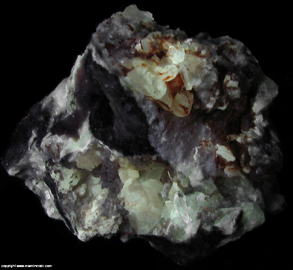 Fluorescent Mineral Specimen: Cerussite, Mixed, Unidentified Lead Oxides from Silver Bell Mine, Mineral Mountain, Silver Bell District, Silver Bell Mts, Pima Co.,Arizona