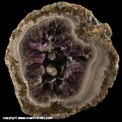 Mineral Specimen: Amethyst / Agate Coconut Geode with Calcite Crystals from Chihuahua, Mexico Mineral Specimen: Amethyst / Agate Coconut Geode with Calcite Crystals from Chihuahua, Mexico