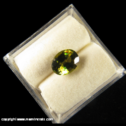 Mineral Specimen: Titanite (Sphene) Cut Gemstone - Green with Orange Flashes from Madagascar Mineral Specimen: Titanite (Sphene) Cut Gemstone - Green with Orange Flashes from Madagascar