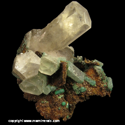 Mineral Specimen: Hexagonal Calcite partially Pseudomorphed to Malachite on Chalcopyrite Pseudomorph Casts after Galena from Sweetwater Mine, Viburnum Trend Dist., Reynolds Co., Missouri Mineral Specimen: Hexagonal Calcite partially Pseudomorphed to Malachite on Chalcopyrite Pseudomorph Casts after Galena from Sweetwater Mine, Viburnum Trend Dist., Reynolds Co., Missouri