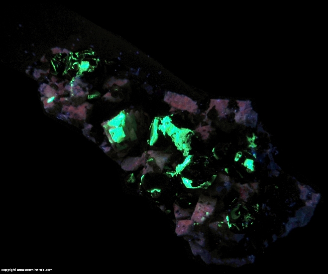 Fluorescent Mineral Specimen: Spessartine Garnet, Smoky Quartz, Microcline, Hyaline Opal from Tongbei, Fujian, China Fluorescent Mineral Specimen: Spessartine Garnet, Smoky Quartz, Microcline, Hyaline Opal from Tongbei, Fujian, China