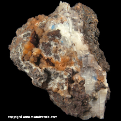Minerals Specimen: Kinoite Included in Calcite, Orange Prehnite from Knife River, St. Luois Co., Minnesota
