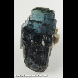 Mineral Specimen: Indicolite Tourmaline with Hexagonal Lepidolite from Karibib, Erongo, Namibia Mineral Specimen: Indicolite Tourmaline with Hexagonal Lepidolite from Karibib, Erongo, Namibia