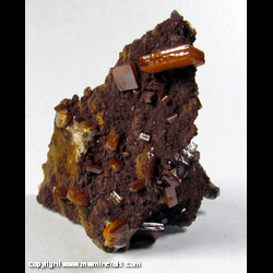 Minerals Specimen: Vanadinite, Descloizite on Barite from Los Lamentos, Chihuahua, Mexico