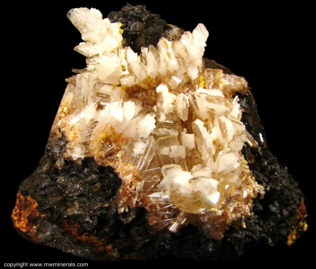 Mineral Specimen: Hemimorphite, Calcite and Mimetite from Mina Ojuela, Mapimi, Durango, Mexico