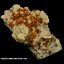 Mineral Specimen: Spessartine Garnet Crystals on Microcline from Tongbei, Fujian, China Mineral Specimen: Spessartine Garnet Crystals on Microcline from Tongbei, Fujian, China