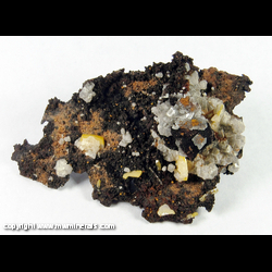 Mineral Specimen: Wulfenite, Calcite from Mina Ojuela, Mapimi, Durango, Mexico Mineral Specimen: Wulfenite, Calcite from Mina Ojuela, Mapimi, Durango, Mexico