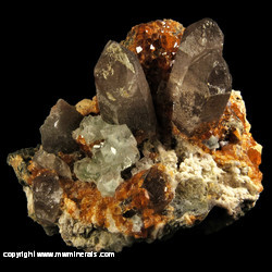 Mineral Specimen: Green and Purple Fluorite, Spessartine Garnet, Smoky Quartz, Microcline, Muscovite from Tongbei, Fujian, China Mineral Specimen: Green and Purple Fluorite, Spessartine Garnet, Smoky Quartz, Microcline, Muscovite from Tongbei, Fujian, China