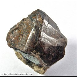 Mineral Specimen: Cassiterite Crystal with Unidentified Black Crystal from Cornwall, England Mineral Specimen: Cassiterite Crystal with Unidentified Black Crystal from Cornwall, England