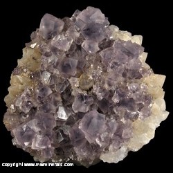Minerals Specimen: Fluorite on Quartz with Pseudomorphic Casts after Fluorite from Frazer's Hush Mine, Rookhope, Stanhope, County Durham, England