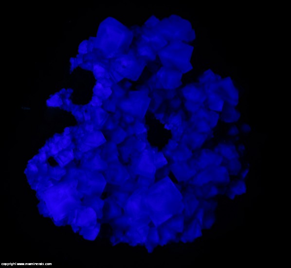 Fluorescent Mineral Specimen: Fluorite on Quartz with Pseudomorphic Casts after Fluorite from Frazer's Hush Mine, Rookhope, Stanhope, County Durham, England