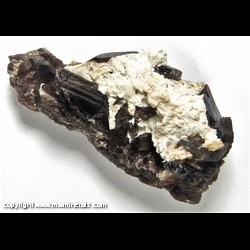 Minerals Specimen: Axinite, Calcite from Miracle Mountain Mine, Garnet Hill, near Volcano, Calaveras Co., California