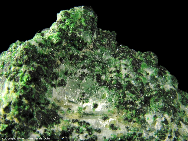 Mineral Specimen: Chrome Grossular Garnet, Chromite on Calcite from Orford Nickel mine, St-Denis-de-Brompton, Sherbrooke County, Quebec, Canada