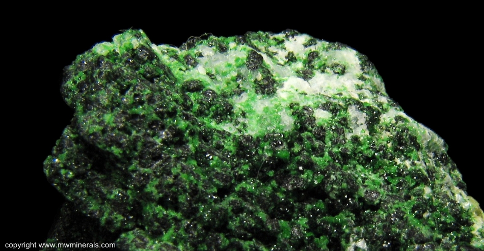 Mineral Specimen: Chrome Grossular Garnet, Chromite on Calcite from Orford Nickel mine, St-Denis-de-Brompton, Sherbrooke County, Quebec, Canada