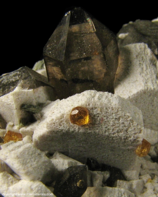 Mineral Specimen: Spessartine Garnet on Microcline with Smoky Quartz from Tongbei, Yunxiao County, Zhangzhou Prefecture, Fujian Province, China