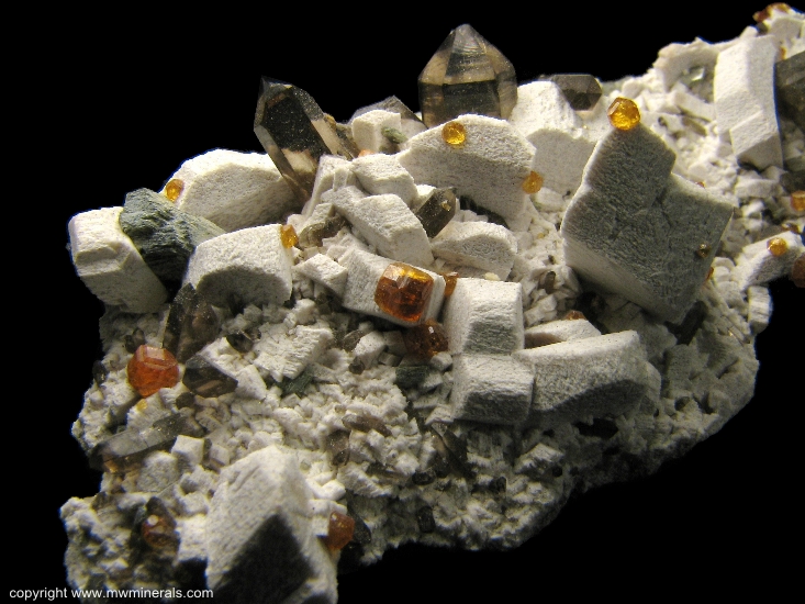 Mineral Specimen: Spessartine Garnet on Microcline with Smoky Quartz from Tongbei, Yunxiao County, Zhangzhou Prefecture, Fujian Province, China