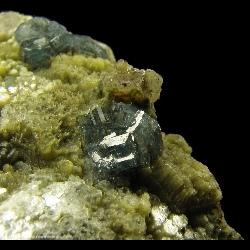 Minerals Specimen: Blue Fluorapatite on Green Muscovite from Emmons Quarry, Uncle Tom Mountain, Greenwood, Oxford Co., Maine, USA