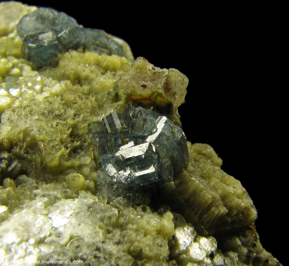 Mineral Specimen: Blue Fluorapatite on Green Muscovite from Emmons Quarry, Uncle Tom Mountain, Greenwood, Oxford Co., Maine, USA