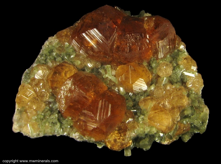 Mineral Specimen: Grossular Garnet variety: Hessonite on Diopside from Jeffrey Quarry, Asbestos, Les Sources RCM, Estrie, Quebec, Canada