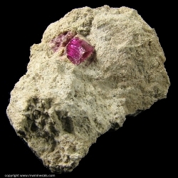 Minerals Specimen: Red Beryl on Rhyolite Matrix from Violet Claims, Wah Wah Mountains, Beaver County, Utah, USA Minerals Specimen: Red Beryl on Rhyolite Matrix from Violet Claims, Wah Wah Mountains, Beaver County, Utah, USA